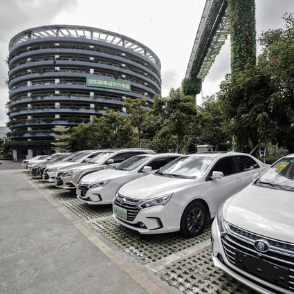 A fleet of BYD-made vehicles seen in front of a parking tower at the company’s headquarters in Shenzhen. Photo: Bloomberg