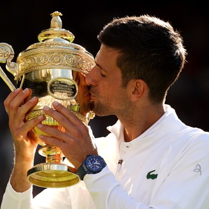 Novak Djokovic celebrates after beating Nick Kyrgios in their men’s singles final at Wimbledon. Photo: DPA