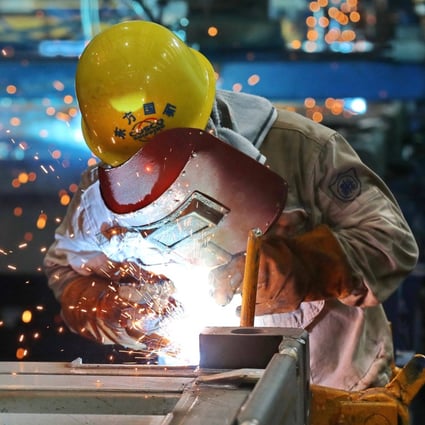 China’s economy grew by 0.4 per cent in the second quarter, compared with a year earlier, down from the 4.8 per cent growth seen in the first three months of the year. Photo: AFP

