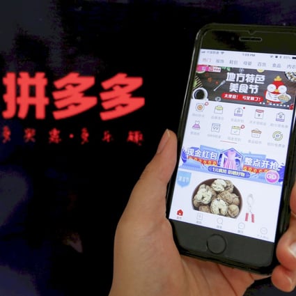The logo of Chinese online group discounter Pinduoduo seen next to its mobile phone app in this illustration picture taken July 17, 2018. Photo: Reuters