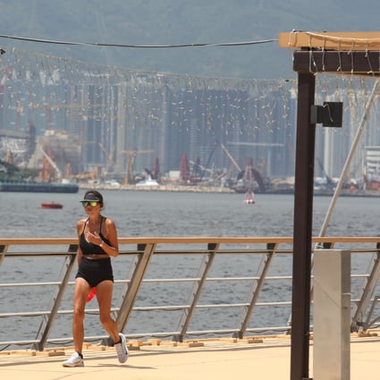 A runner braves the high temperatures at East Coast Park Precinct. Photo: Yik Yeung-man
