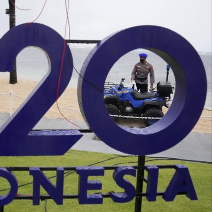 A police officer patrols the beach at the venue of the G20 meeting in Nusa Dua, Bali, Indonesia, on July 7. Photo: EPA-EFE