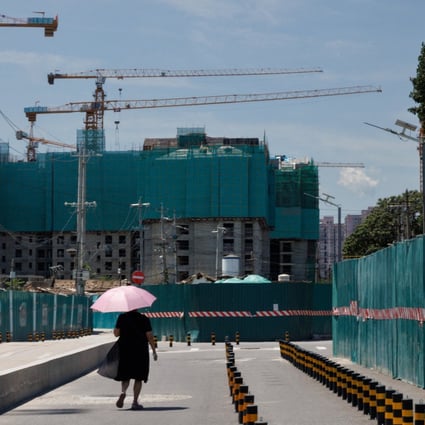 A construction site in Beijing. Other banks will follow suit if the pilot scheme works well, aiming to raise the fund up to 300 billion yuan. Photo: Reuters
