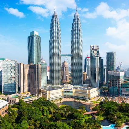 Malaysia’s landmark Petronas Twin Towers and other buildings are seen in Kuala Lumpur. Photo: Shutterstock