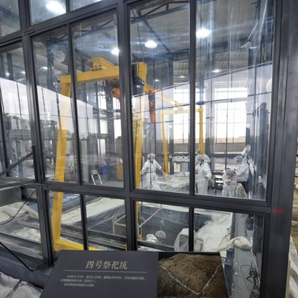Glass cabins are kept at 20 to 25 degrees Celsius and at 80 per cent humidity during the excavation work. Photo: Xinhua 