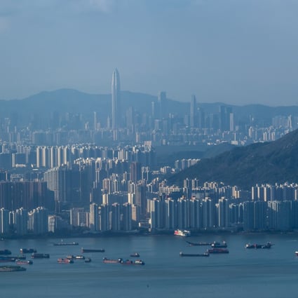 Buildings in Shenzhen are visible beyond residential blocks in Hong Kong. Photo: Bloomberg
