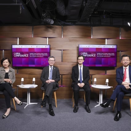 Thursday’s panel at the 2022 SCMP China Conference included, from left, moderator and Deputy Business Editor Peggy Sito, JLL’s Joseph Tsang, HKU’s Chau Kwong-wing and Colliers’ Lau Chun-kong. Photo: Jonathan Wong