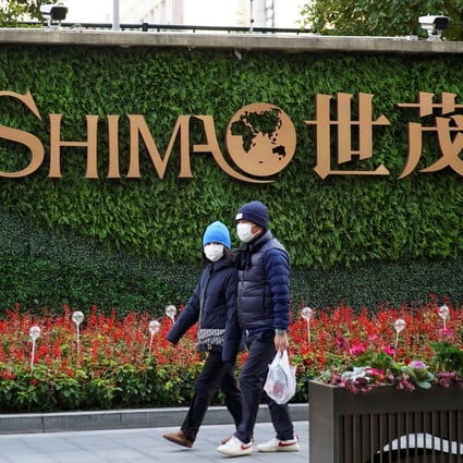 The logo of the Chinese property developer Shimao Group near Shimao Tower in Shanghai on January 13, 2022. Photo: Reuters.