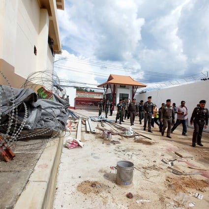 Police inspect the exterior of an immigration detention centre in Songkhla on November 21, 2017. File photo: AFP