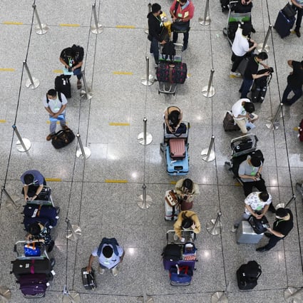 Passengers arrive at Hong Kong International Airport on July 25. Photo: K. Y. Cheng