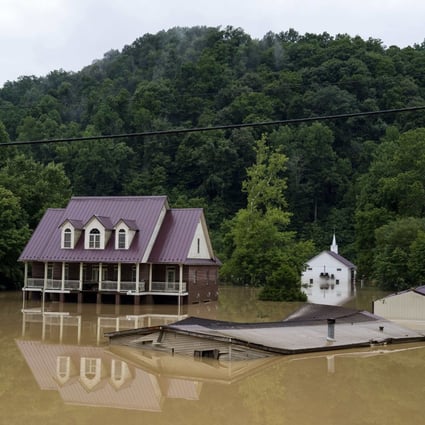 A house is seen almost completely submerged in Breathitt County, Kentucky, US on Friday. Photo: Getty Images / AFP