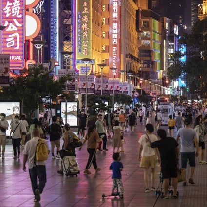 Shoppers and visitors walk along Nanjing Road shopping street in Shanghai. Small businesses in the city are still suffering from the government’s zero Covid strategy. Photo: Bloomberg.