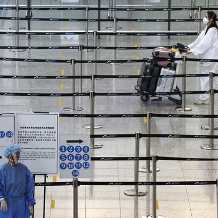 Arrivals at Hong Kong International Airport. Even a shortened quarantine time is ‘not ideal’ for international investors, says Nelson Chow, the HKIFA’s chairman. Photo: K Y Cheng