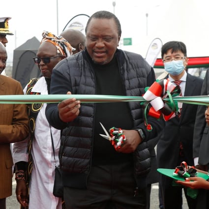 Kenyan President Uhuru Kenyatta cuts the ribbon at the commissioning ceremony of the Nairobi Expressway financed by the China Road and Bridge Corporation in Nairobi on Sunday. Photo: Reuters