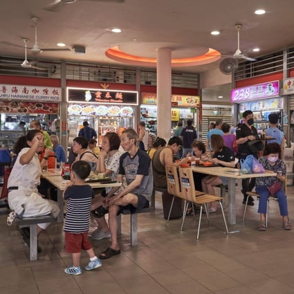 People have breakfast at Tiong Bahru Market hawker centre in Singapore last month. Photo: Bloomberg