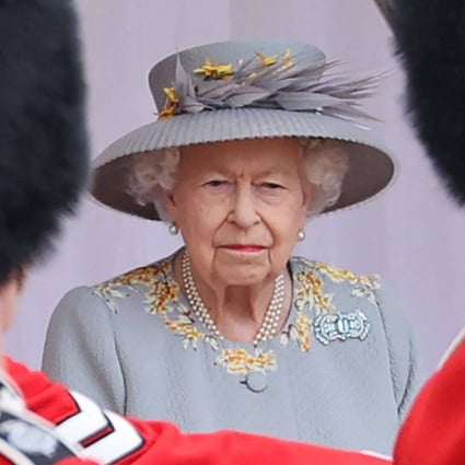 Britain’s Queen Elizabeth watches a military ceremony to mark her official birthday at Windsor Castle in June 2021. Photo: AFP