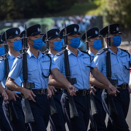 Police officers take part in a graduation parade at the Hong Kong Police College in Hong Kong on July 9. The city could introduce a Volunteers in Policing programme similar to Australia’s. Photo: EPA-EFE