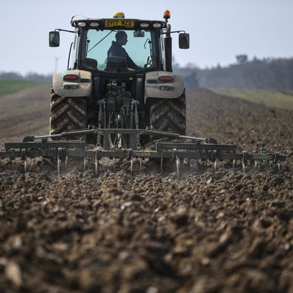A tractor prepares farmland in England for sowing crops. Environmental activist George Monbiot says our current, large-scale, tillage farms – fuelled by fertiliser overkill – are killing soil fertility and aren’t the solution to feeding the world’s growing population. Photo: AFP