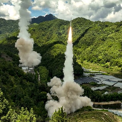 The Rocket Force of the PLA Eastern Theatre Command fires missiles into the waters off the eastern coast of Taiwan from an undisclosed location last week. Photo: Handout