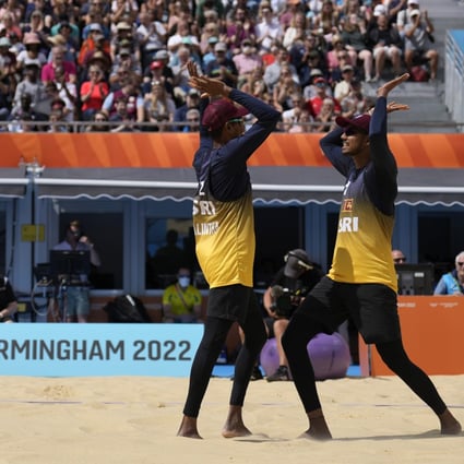 Sri Lankan players celebrate scoring a point during the men’s beach volleyball quarterfinal match against Australia at the Commonwealth Games in Birmingham on Friday. Photo: AP