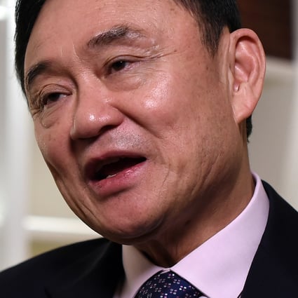 Currently in exile,  deposed former Thai Prime Minister Thaksin Shinawatra has called on supporters of the Pheu Thai party to vote strategically to end the reign of Prime Minister Prayuth Chan-ocha. Photo: AFP/File