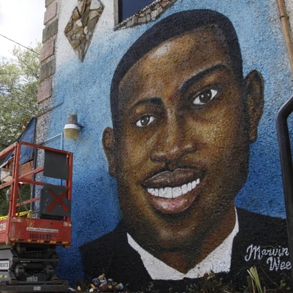 A painted mural of Ahmaud Arbery where the 25-year-old man was shot and killed in a racially motivated hate crime. Photo: AP 