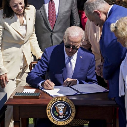 US President Joe Biden signing the Chips and Science Act of 2022 during a ceremony on the South Lawn of the White House on Tuesday. Photo: Bloomberg