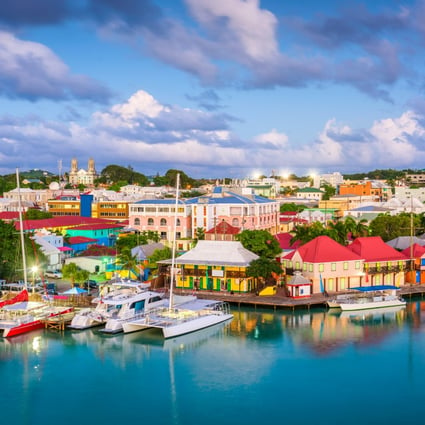 [Shutterstock] St. John’s, Antigua and Barbuda town skyline on Redcliffe Quay at dusk. 
Credit: Shutterstock
Stock Photo ID: 1144114301