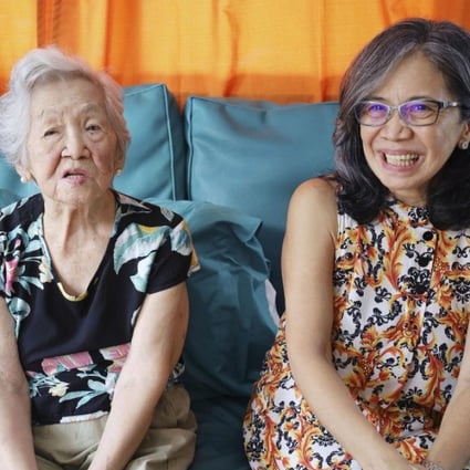 President of the new Palawan Nikkeijin chapter Margarette Lumauag, right, and her second-generation Nikkeijin mother Veronica Sabando are seen in their home in Puerto Princesa, a coastal city in the Philippines’ Palawan province, last month. Photo: Kyodo