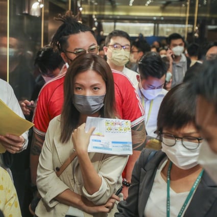 Buyers line up at Henderson Land’s sales office in Tsim Sha Tsui on Wednesday for its upcoming One Innovale-Archway residential development in Fanling. Photo: Xiaomei Chen