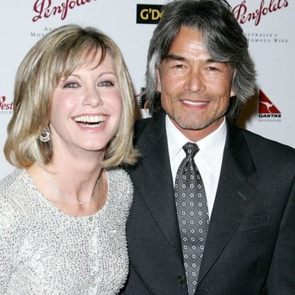 Olivia Newton-John, who died on August 8, aged 73, with her former boyfriend Patrick McDermott, who mysteriously disappeared while on a fishing trip in 2005. Photo: @my234Radio/Twitter