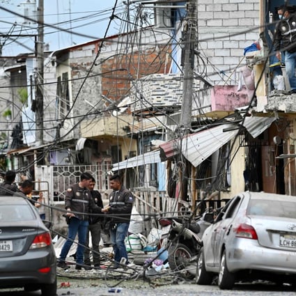 Police inspect the site of an explosion in southern Guayaquil, Ecuador on Sunday. Photo: AFP