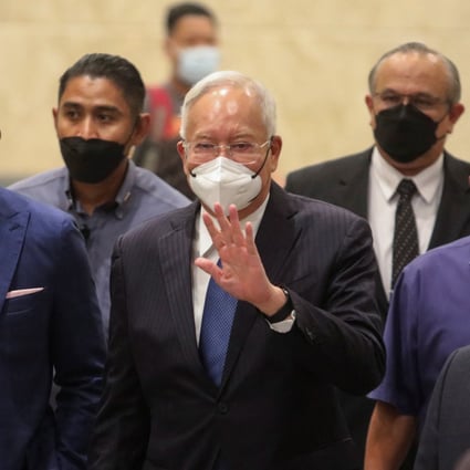 Former Malaysian prime minister Najib Razak (centre) during a break in proceedings at the Federal Court on Monday. Photo: Reuters