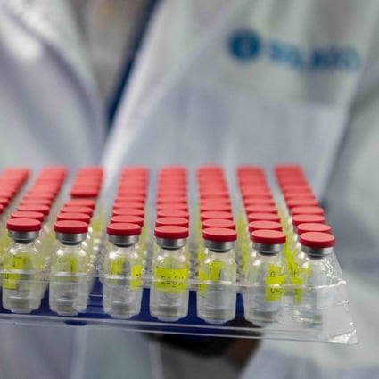 A technician works during a test run of the fill-and-finish process for CanSino vaccines at a Solution Biologics factory in Kuala Lumpur, Malaysia, on September 8, 2021. Photo: Xinhua