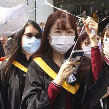 Newly minted Chinese University graduates celebrate their commencement on November 4, 2021. Photo: K.Y. Cheng