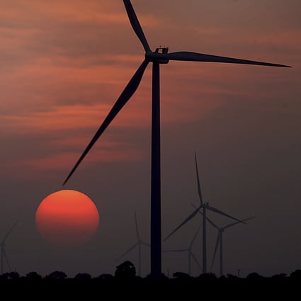 The sun sets at a wind farm in McCook, Texas. States such as California, New York and even Texas have long been ahead of the US federal government in supporting renewables, but that could be about to change with the passage of the Inflation Reduction Act. Photo: AP
