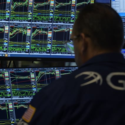 A trader works during the opening bell at the New York Stock Exchange on August 16. Photo: AFP