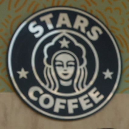 Staff members get ready for the launching of the new coffee shop “Stars Coffee”, which opens following Starbucks Corp company’s exit from the Russian market. Photo: Reuters