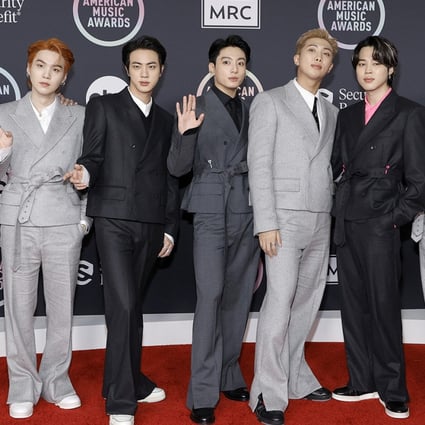 (From left) V, Suga, Jin, Jungkook, RM, Jimin and J-Hope of BTS attend the 2021 American Music Awards at the Microsoft Theater in Los Angeles on November 21, 2021. Photo: TNS