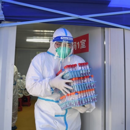 Stringent coronavirus controls such as mass testing have become a huge burden for local governments. Photo: Xinhua