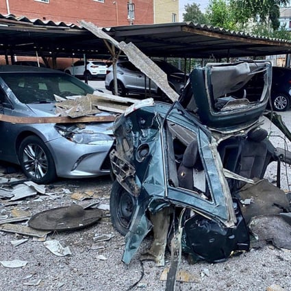 Cars damaged by a Russian military strike in Nikopol, Dnipropetrovsk region, Ukraine  on August 11. Photo: Press service of the State Emergency Service of Ukraine/Handout via Reuters