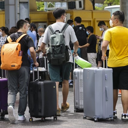Young people with suitcases at Shenzhen Bay Port in Hong Kong. Photo: Dickson Lee