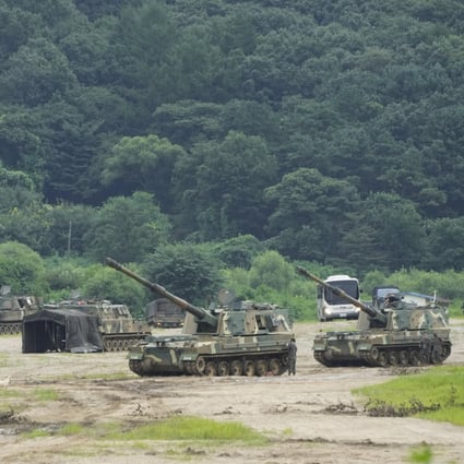 South Korean army K-9 self-propelled howitzers take positions in Paju, near the border with North Korea on Monday. The United States and South Korea began their biggest combined military training in years earlier this week. Photo: AP