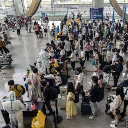 Travellers queue for Covid tests on arrival at Changshui International Airport in Kunming, China. Foreign students enrolled in Chinese universities have been locked out of the country for 2½ years because of Beijing’s strict pandemic measures. Photo: Bloomberg
