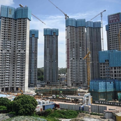 A construction site for a housing complex by Chinese property developer Poly Group is seen in Dongguan, southern Guangdong province, on July 13. Photo: AFP