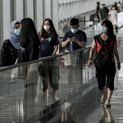 People in Changi Airport in Singapore. Photo: EPA-EFE