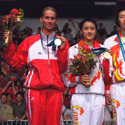 Gong Zhichao (centre) of China won gold, Camilla Martin (left) of Denmark took Silver and Ye Zhaoying bronze in the women’s badminton at the 200 Olympic Games in Sydney. Photo: Allsport