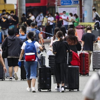 Travellers at Shenzhen Bay Port in Hong Kong head for mainland China. Photo: Dickson Lee