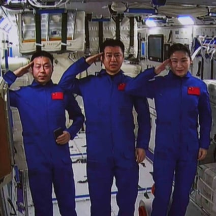 A July 25 screen image of taikonauts (from left) Cai Xuzhe, Chen Dong and Liu Yang in the first module of China’s space station. Photo: Xinhua