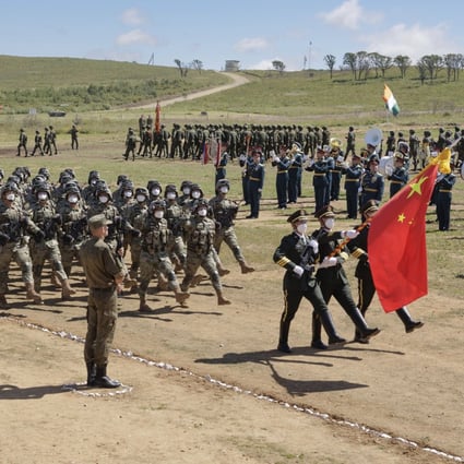 Chinese troops parade ahead of the Vostok military exercises in the east of Russia. Photo: AP